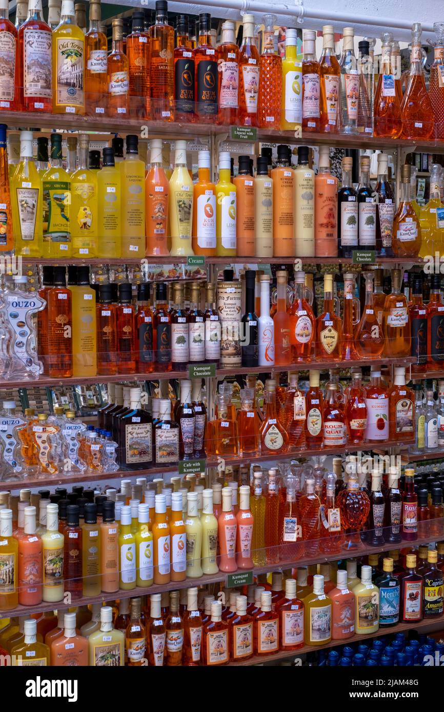 bottle shop in street market, Corfu Town, Corfu or Kerkyra, Greece Stock Photo