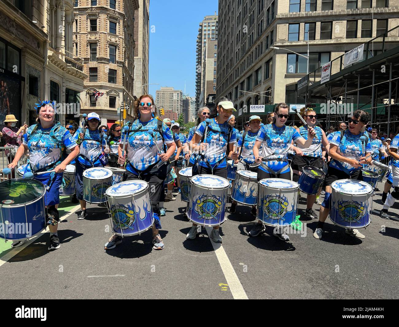 Fogo Azul womens Drumline Samba Band leads the New York City Dance Parade down Broadway in New York City. Stock Photo