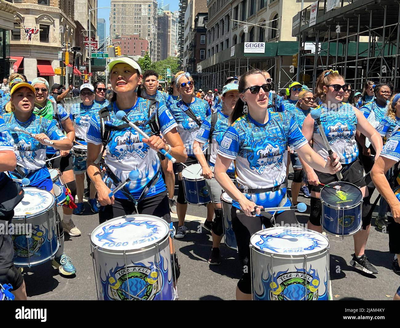 Fogo Azul womens Drumline Samba Band leads the New York City Dance Parade down Broadway in New York City. Stock Photo