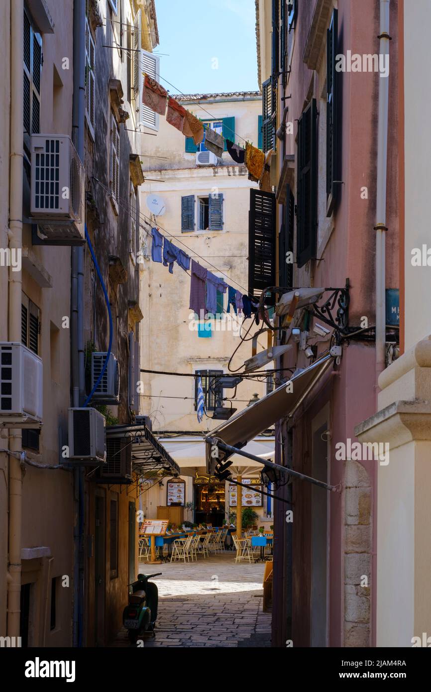 Street view with laundry drying in Corfu Town, Corfu or Kerkyra, Greece Stock Photo