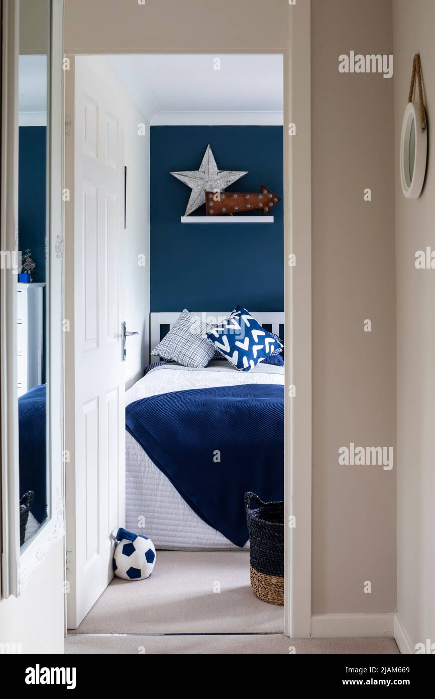 View into Childs bedroom with blue and white theme Stock Photo