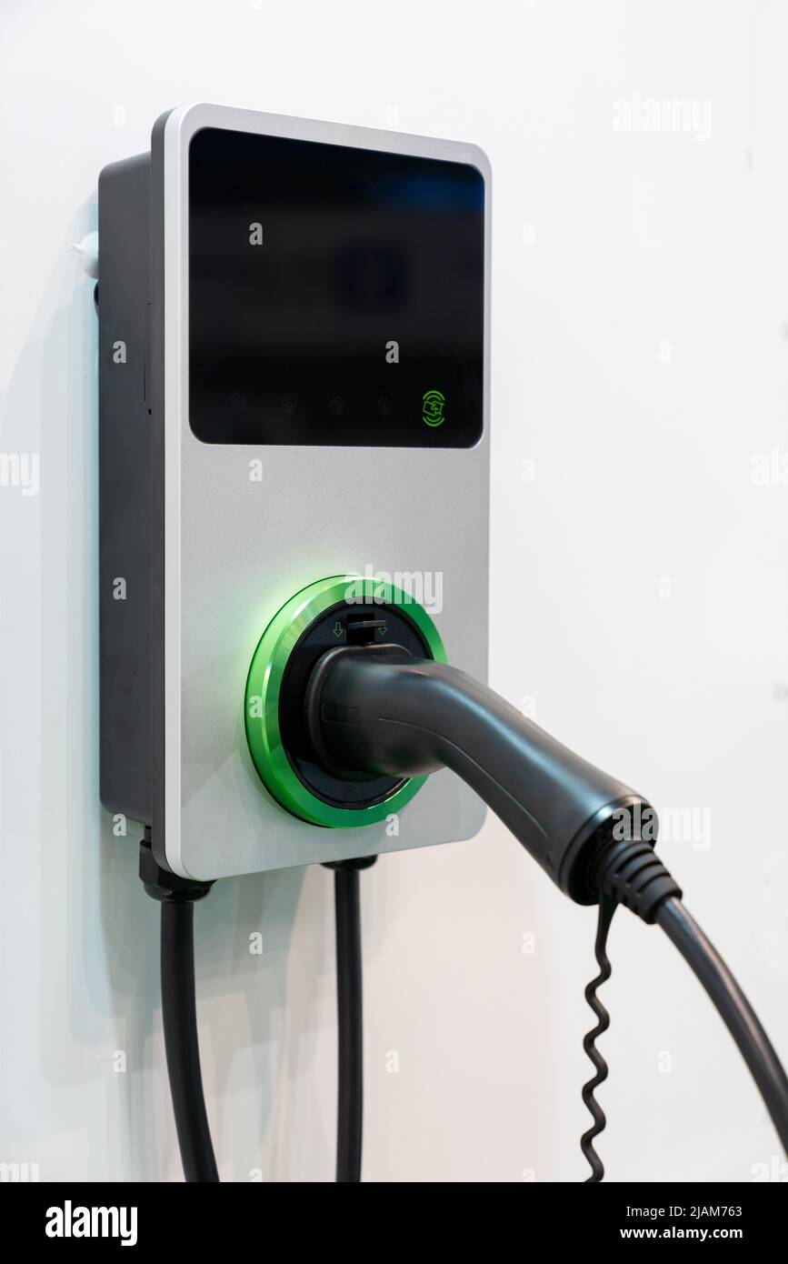 Charging station for electric vehicles on a wall Stock Photo
