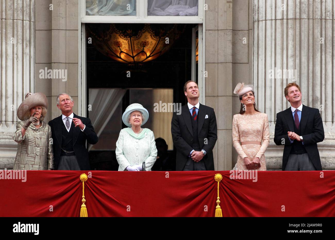 File photo dated 05/06/12 of (left to right) the Duchess of Cornwall, the Prince of Wales, Queen Elizabeth II, the Duke and Duchess of Cambridge and Prince Harry appearing on the balcony of Buckingham Palace to watch the flypast during the Diamond Jubilee celebrations in central London. Issue date: Tuesday May 31, 2022. Stock Photo