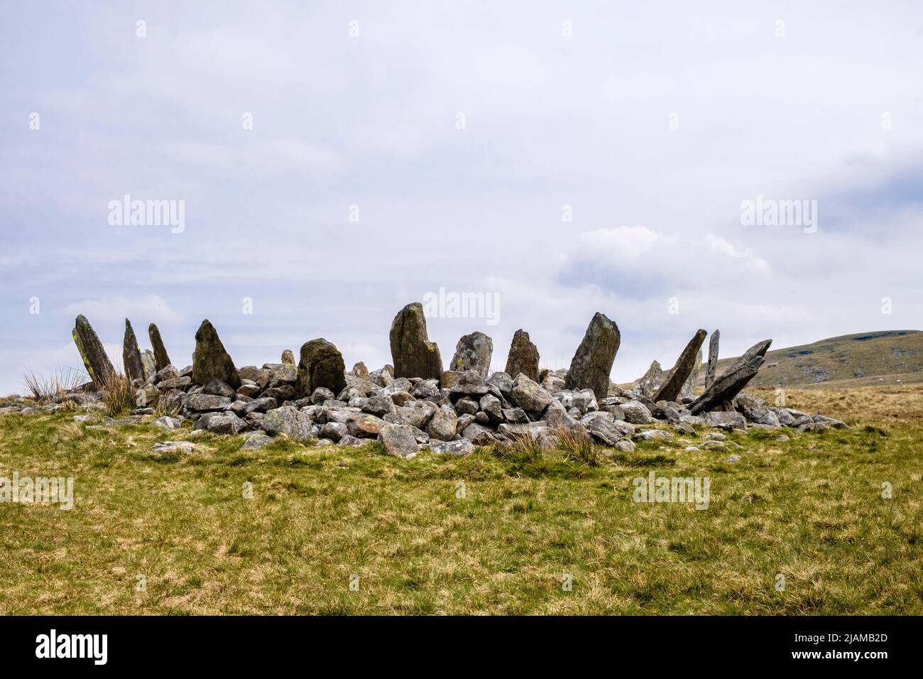 Bryn Cader Faner Bronze Age round cairn burial mound and stone circle in northern Rhinogydd hills of Snowdonia National Park. Talsarnau Gwynedd Wales Stock Photo