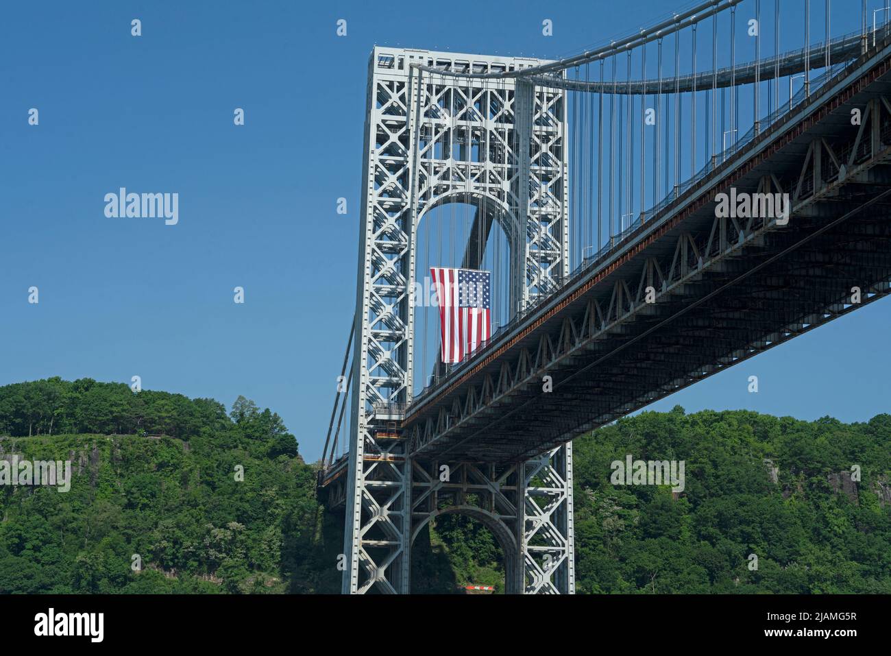 A large U.S. flag flew on the George Washington Bridge in honor of Memorial Day. Stock Photo