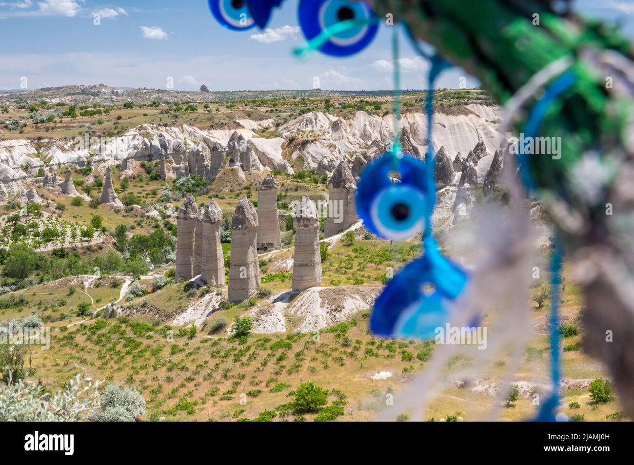 turkish eyes in front of fairy chimneys in Cappadocia Stock Photo