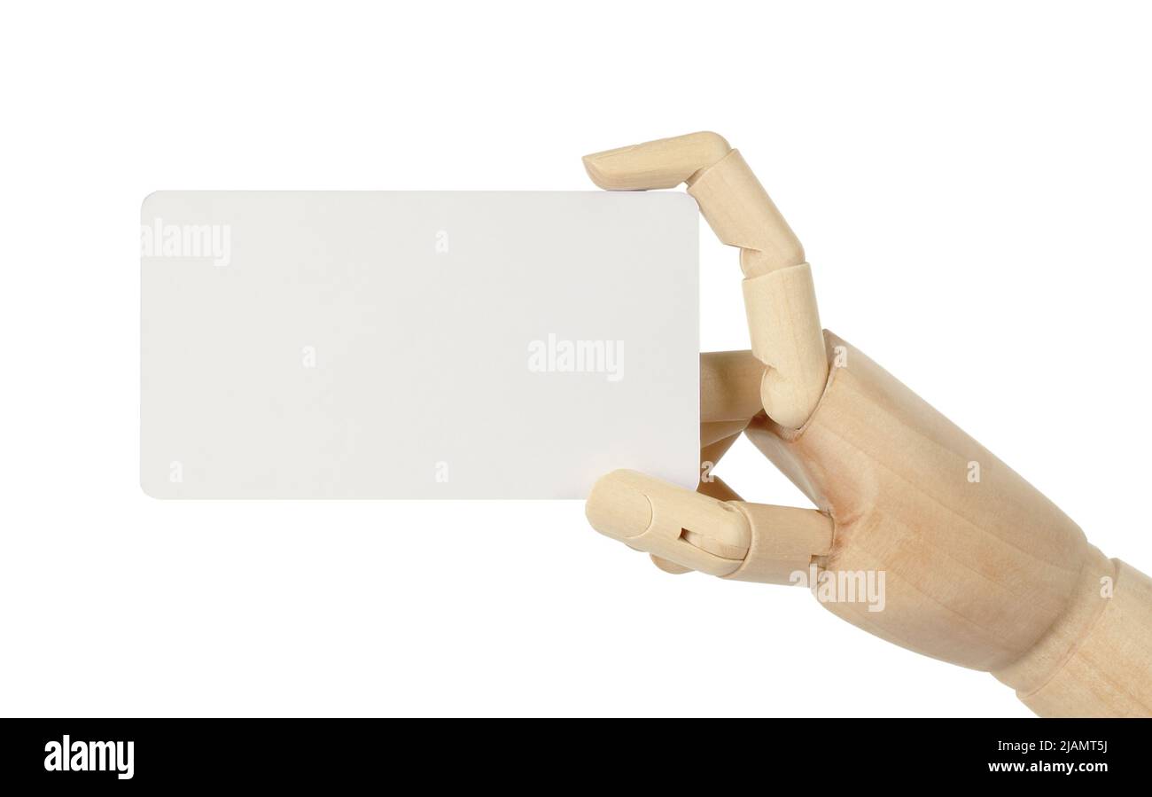 Wooden hand holds blank business card on white background close-up Stock Photo