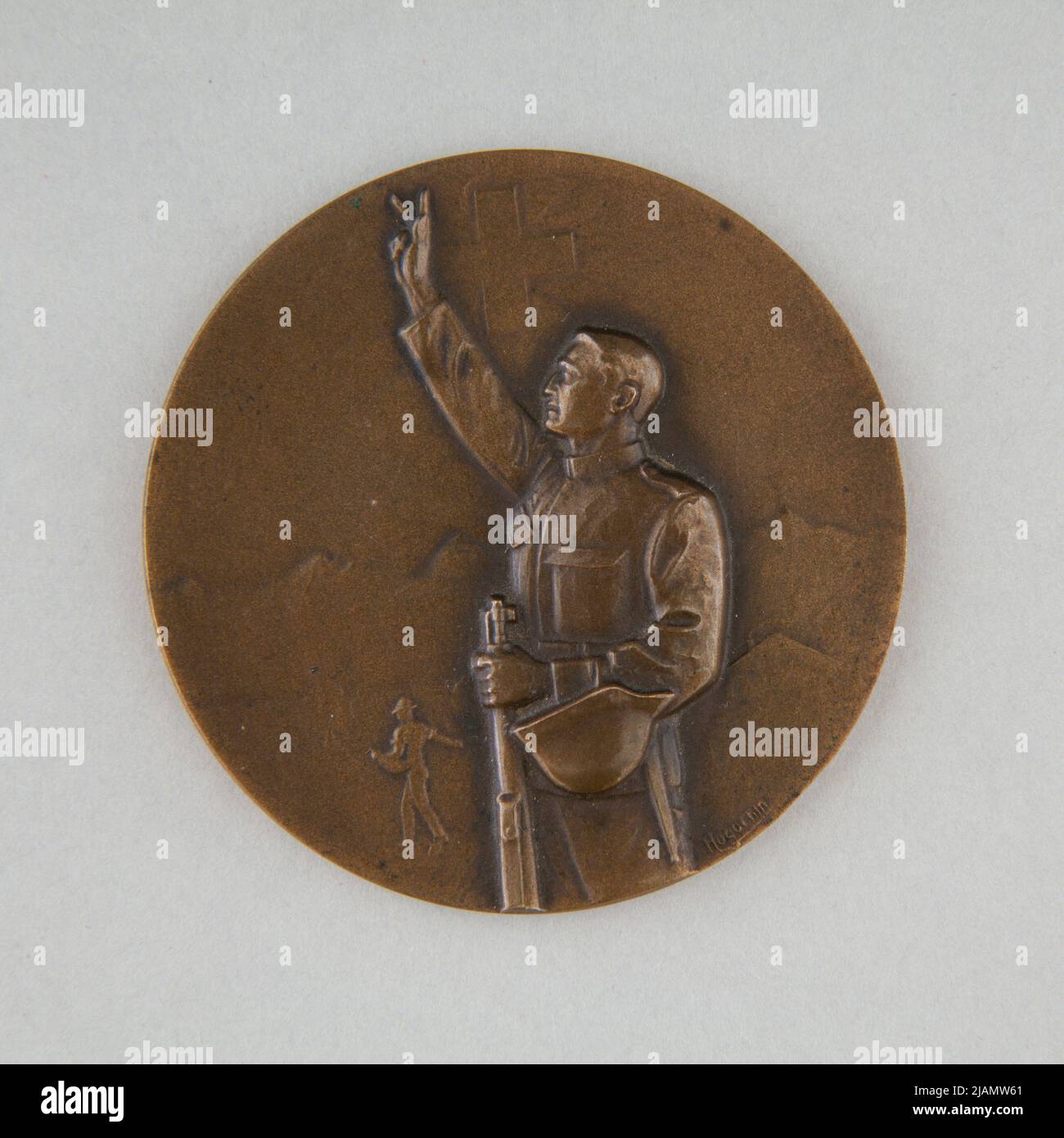 Bronze commemorative medal with the silhouette of sworn Swiss soldier Huguenin Frères & Co Stock Photo