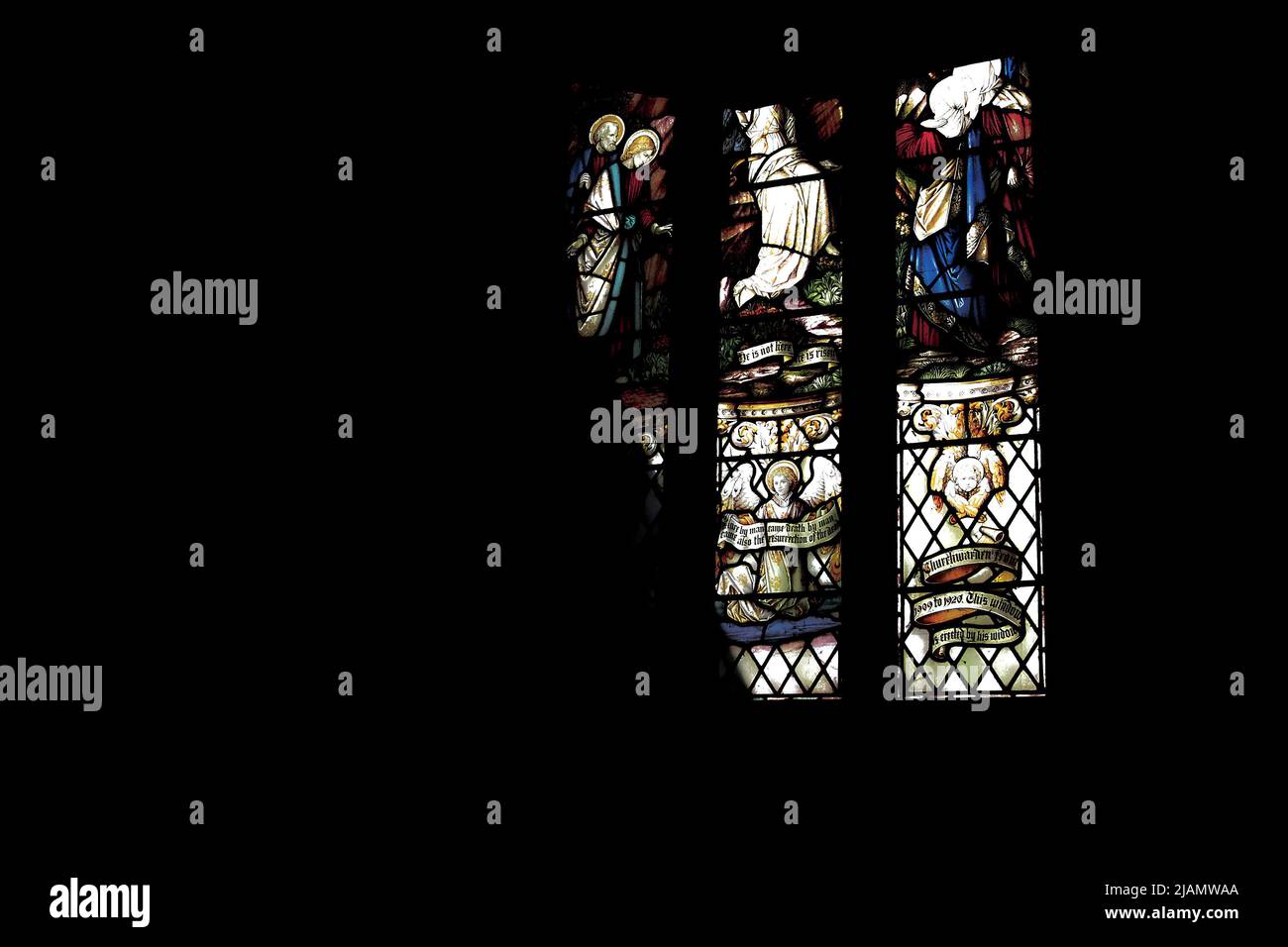 Stained glass window in a dark church Stock Photo - Alamy