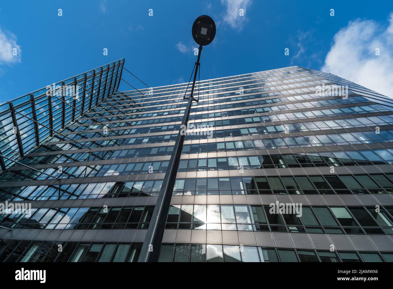 Brussels European District, Brussels Capital Region - Belgium - 02 17 2020  Low angle view of the contemporary staff entrance of a building of the Eur Stock Photo