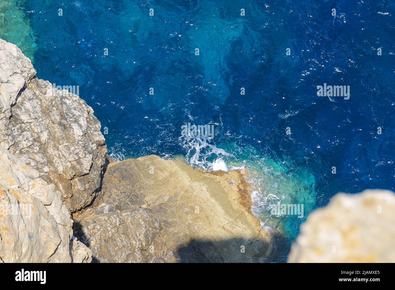 Aerial view of ocean waves in Minorca, Baleari islands, Spain. Stock Photo