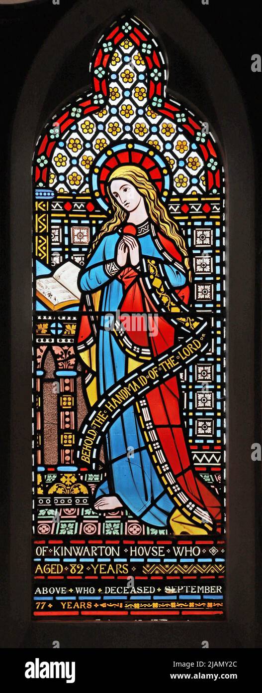 A stained glass window by Alexander Gibbs depicting the Virgin Mary at the Annuciation, St Mary's Church, Kinwarton, Warwickshire Stock Photo