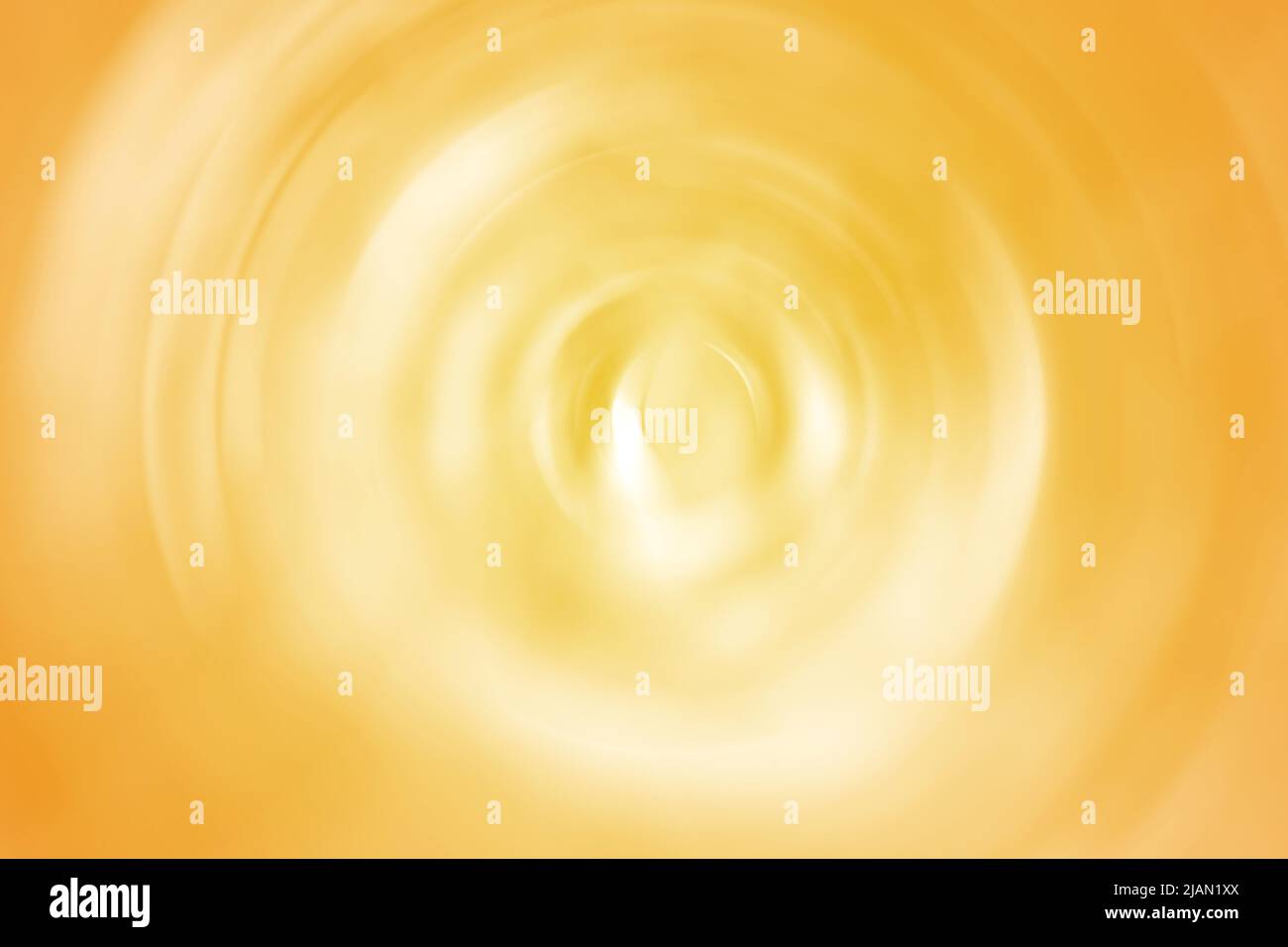 Blurred gradient radial motion summer orange background. Abstract circular texture Stock Photo