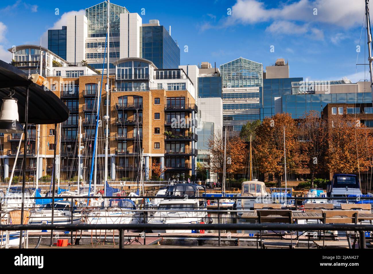 London, UK - Nov 1, 2012: Luxury waterside housing and leisure complex with yachting marina at the St Katharine Docks Stock Photo