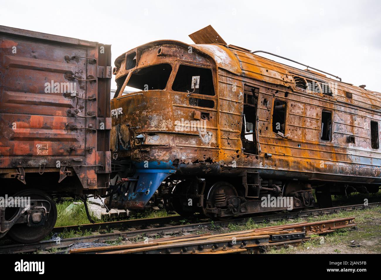 Exploded trains and wagons at the railway station in the city of ...