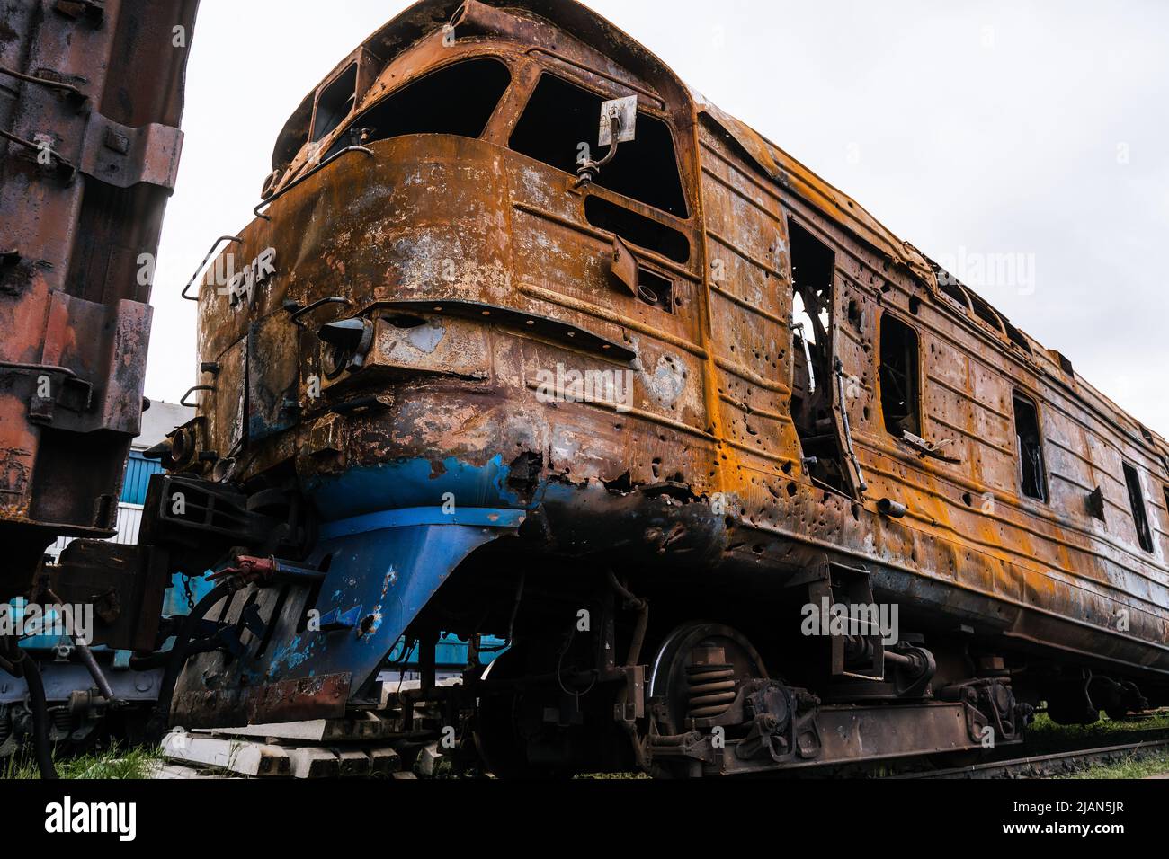 Exploded trains and wagons at the railway station in the city of ...