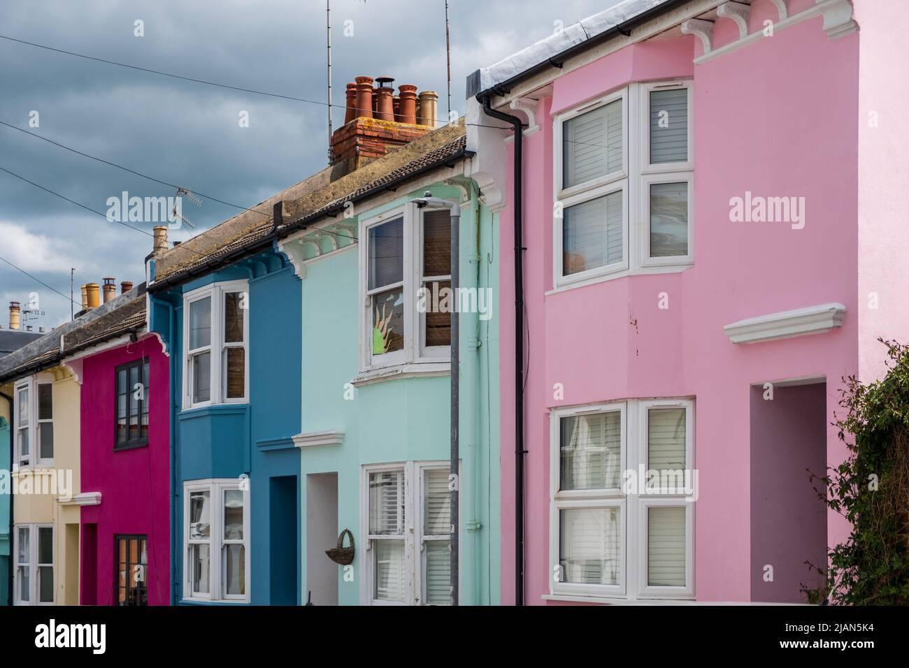Colourful painted terraced cottages on Washington Street in the Hanover neighbourhood of Brighton Stock Photo