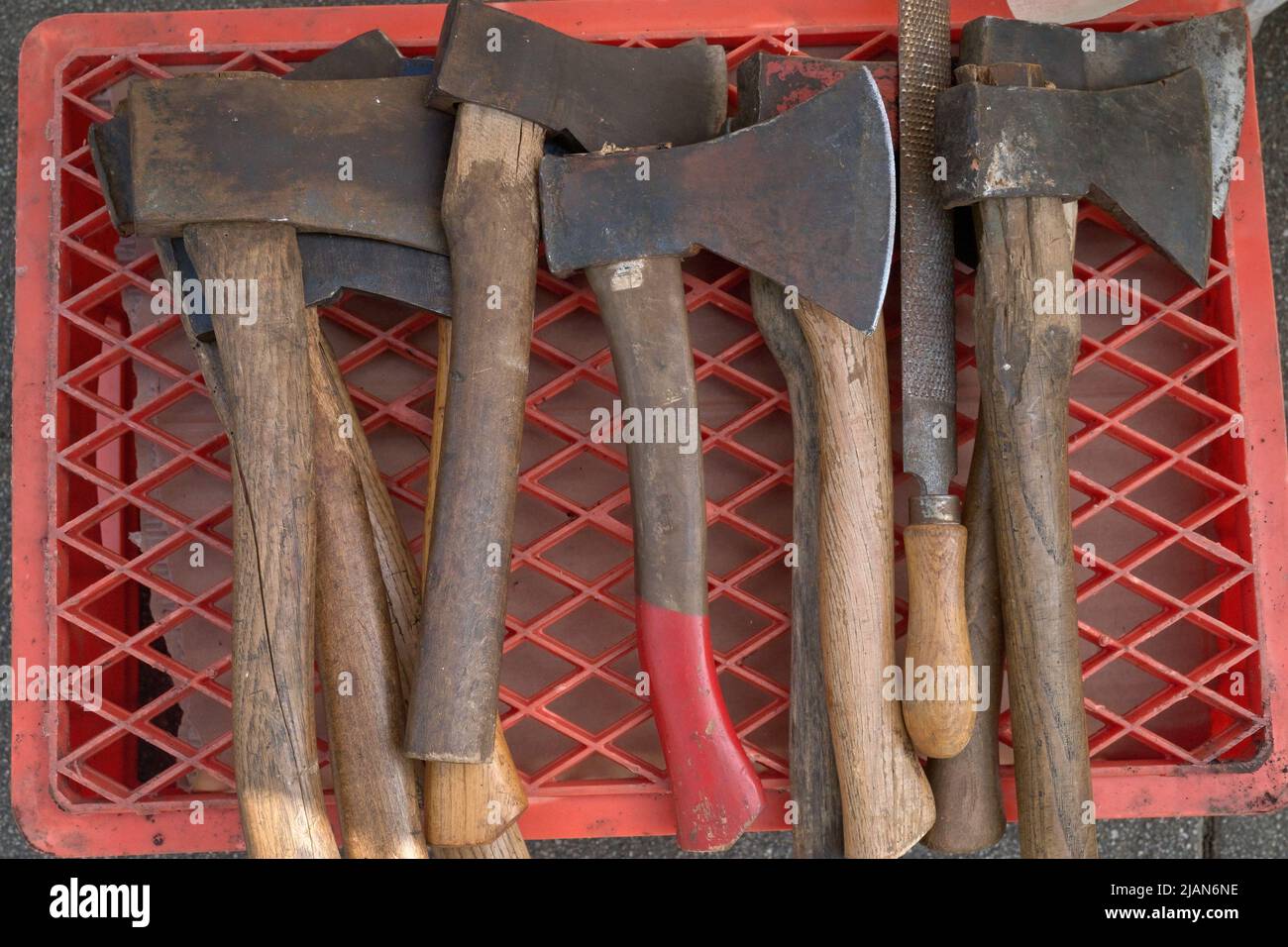 Tools (No. 3) various old and used Hatchets at the flea market in