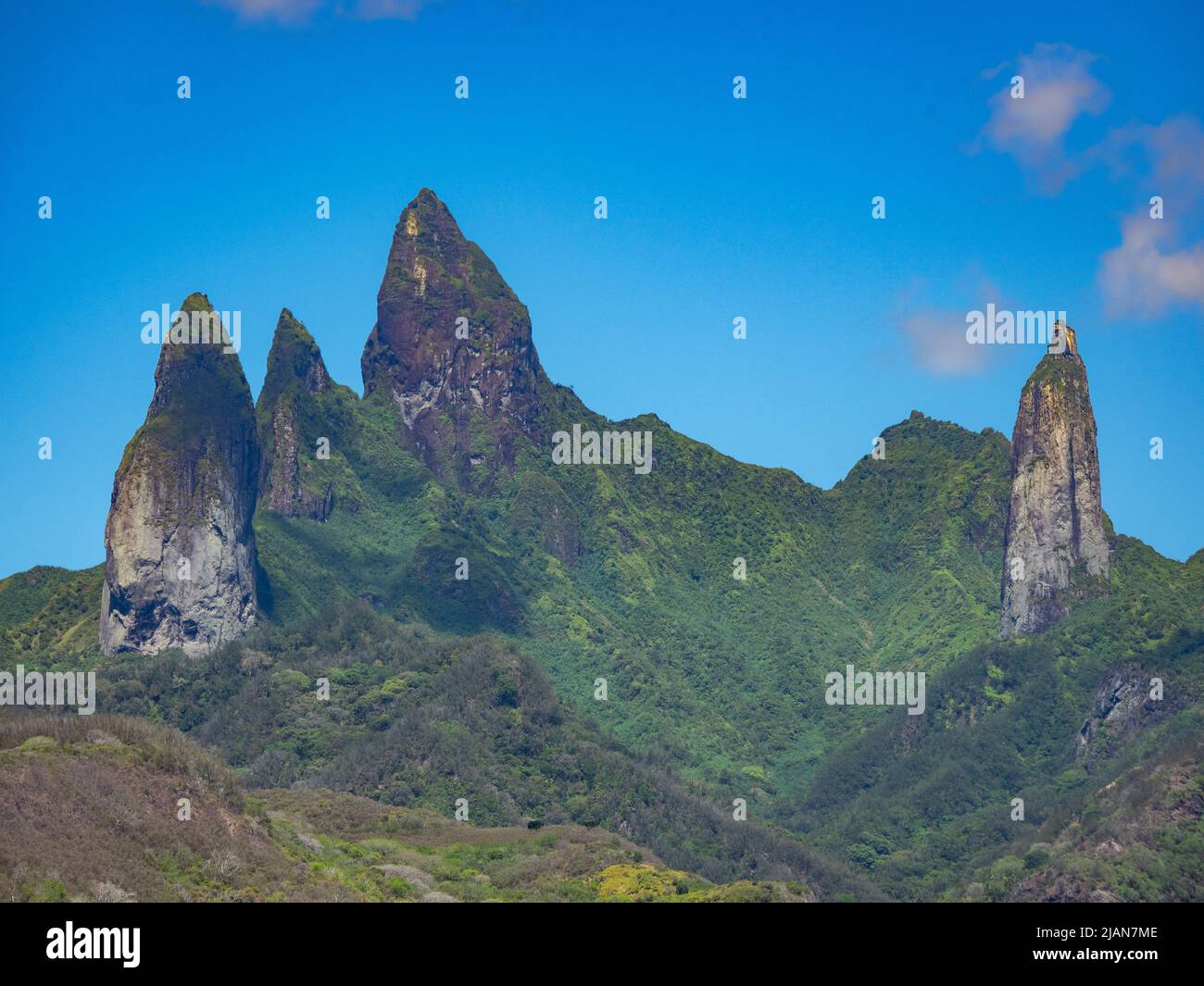The stunning scenery of Ua Pou island with its phonolitic rocks in the Marquesas of French Polynesia Stock Photo