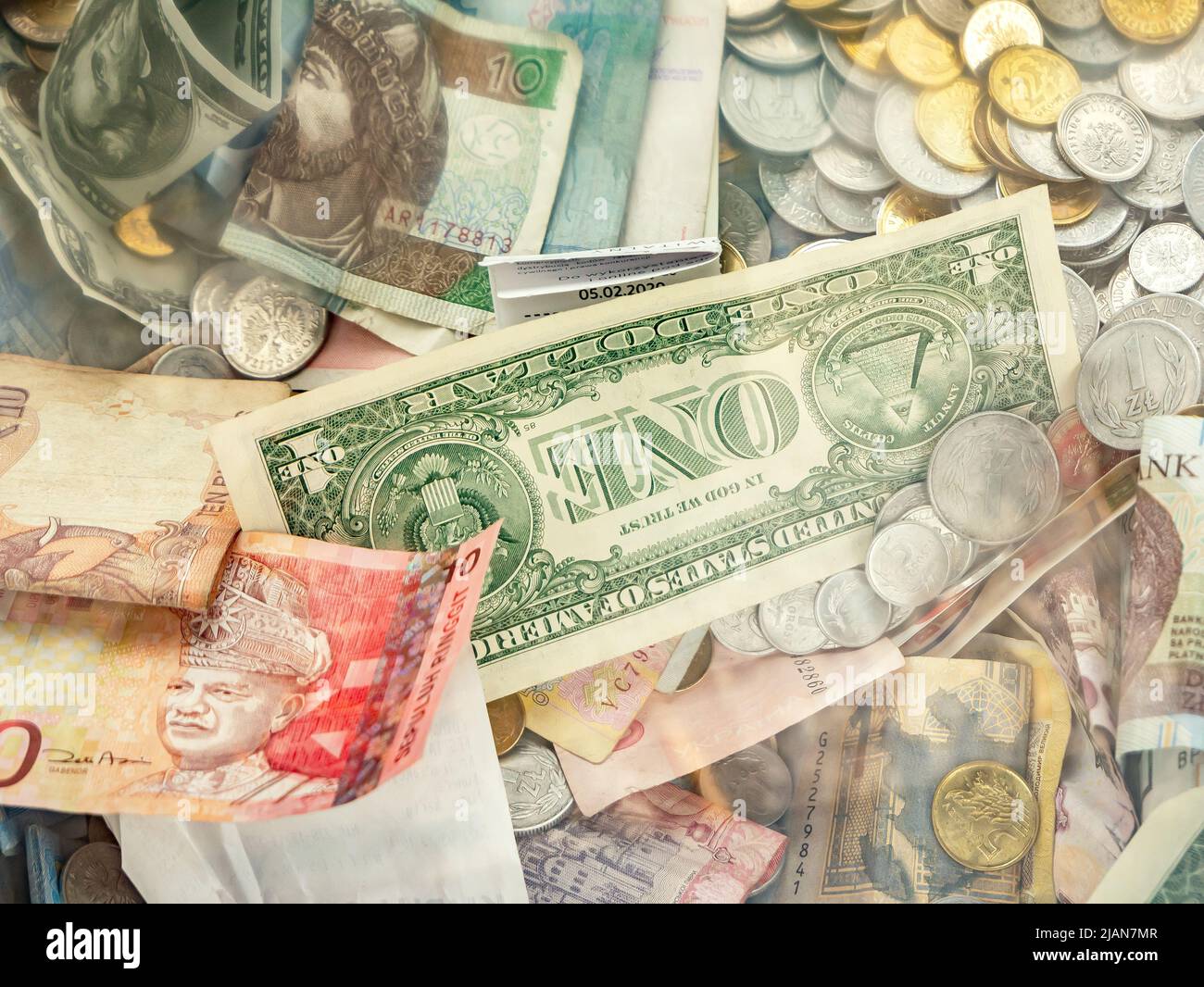 One American dollar bill among many world currencies, cash, money