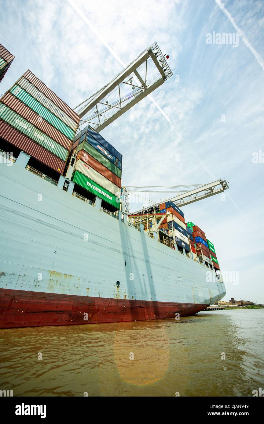 COSCO Development container ship, the largest vessel to call on the East Coast, entered the Savannah River Harbor, heading to Georgia Ports Authority. Stock Photo