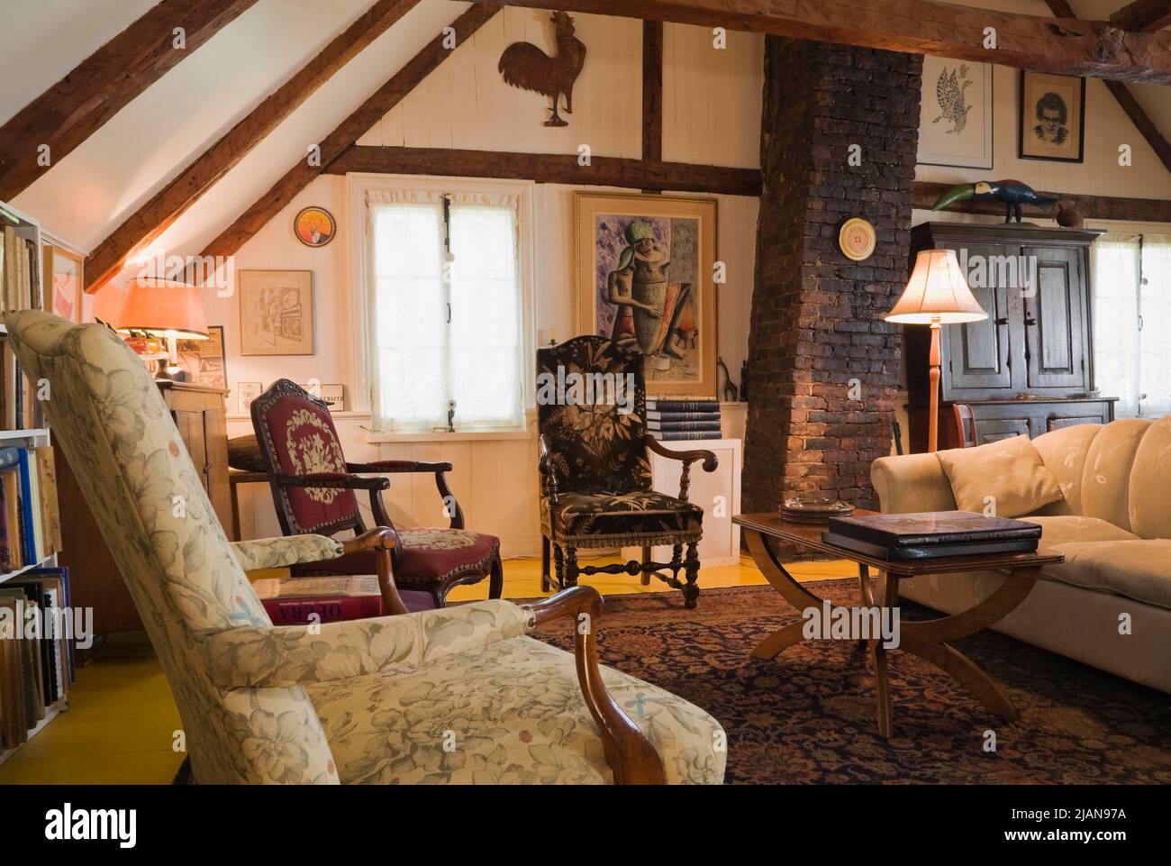 Upholstered chairs, sofa and furnishings in upstairs living room inside