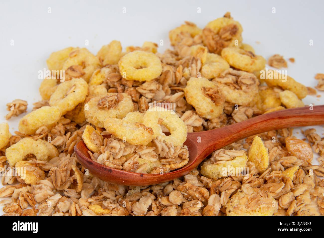 Oatmeal cereal breakfast in wooden spoon textured background Stock Photo