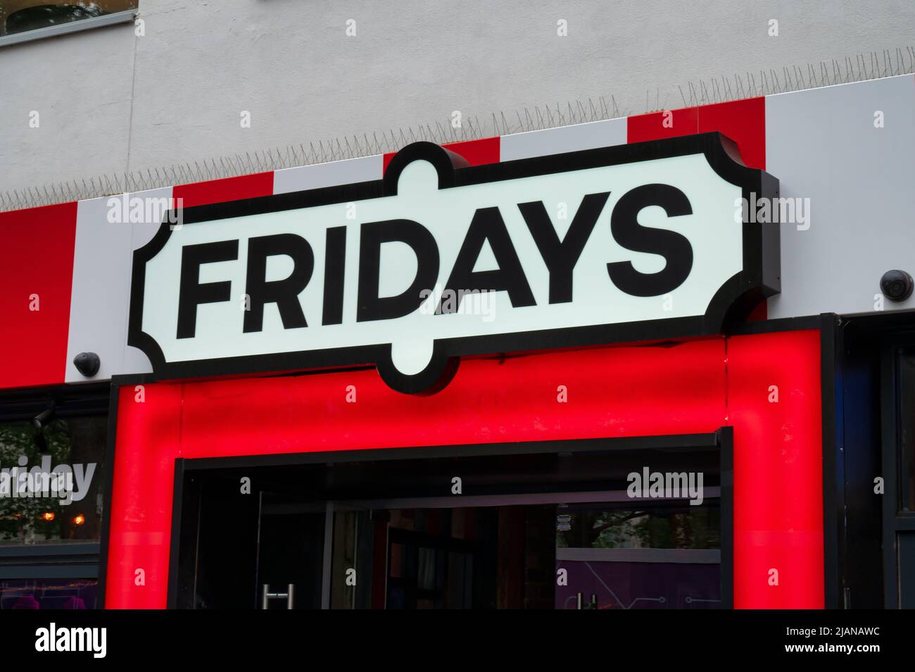 London, UK- May 3, 2022: The sign for Fridays restaurant in London Stock Photo