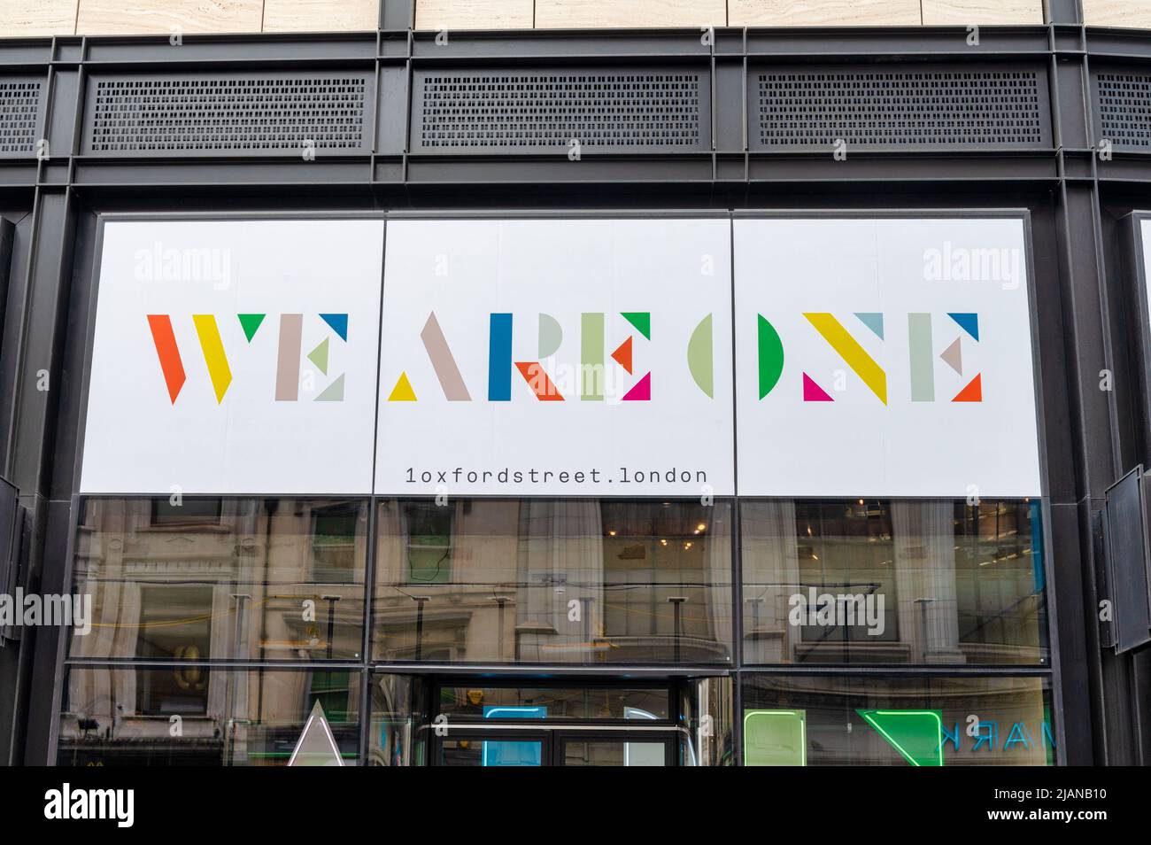 London, UK- May 3, 2022: The sign for the We Are One retail building on Oxford street  in London Stock Photo