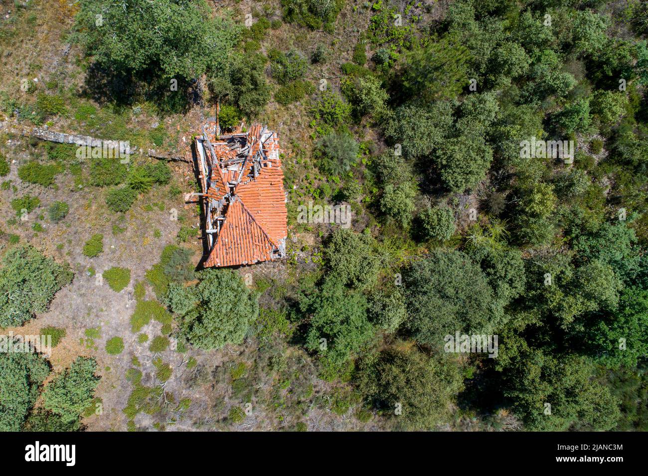 Drone aerial view of an abandoned house in ruins Stock Photo - Alamy