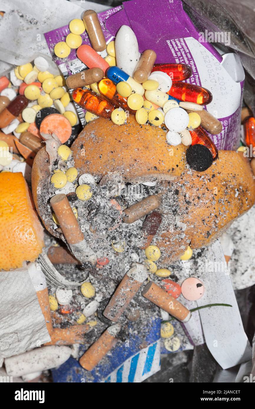 Discarded medicines in household waste Stock Photo