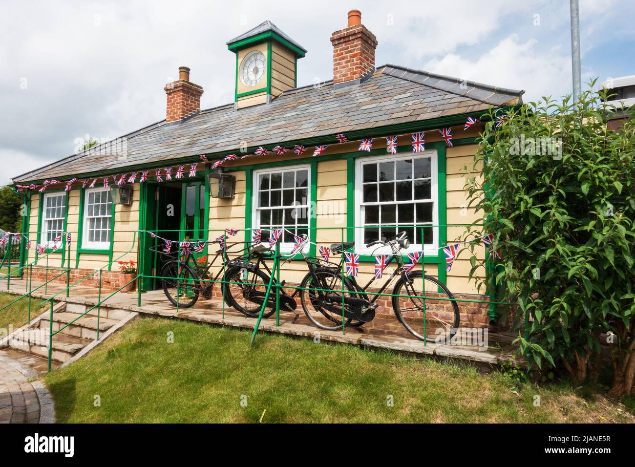 Bannold Station, Fen Drayton, Cambridgeshire, England. Vintage tea rooms in Carriages. Decorated with bunting to celebrate the Queens Platinum Jubilee Stock Photo