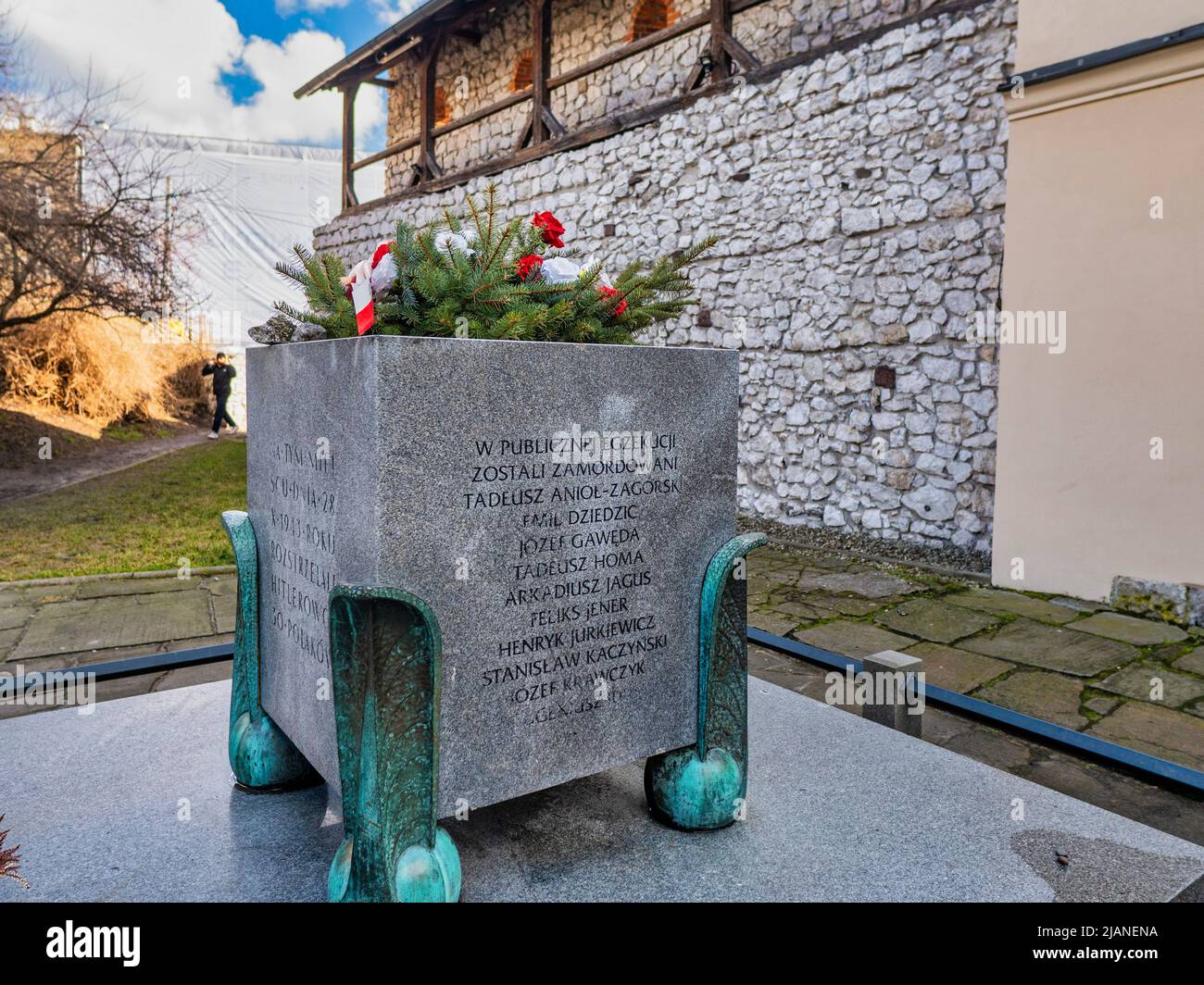 monument located in front of the Old Synagogue on Szeroka Street, commemorating a crime from the Second World War. Stock Photo