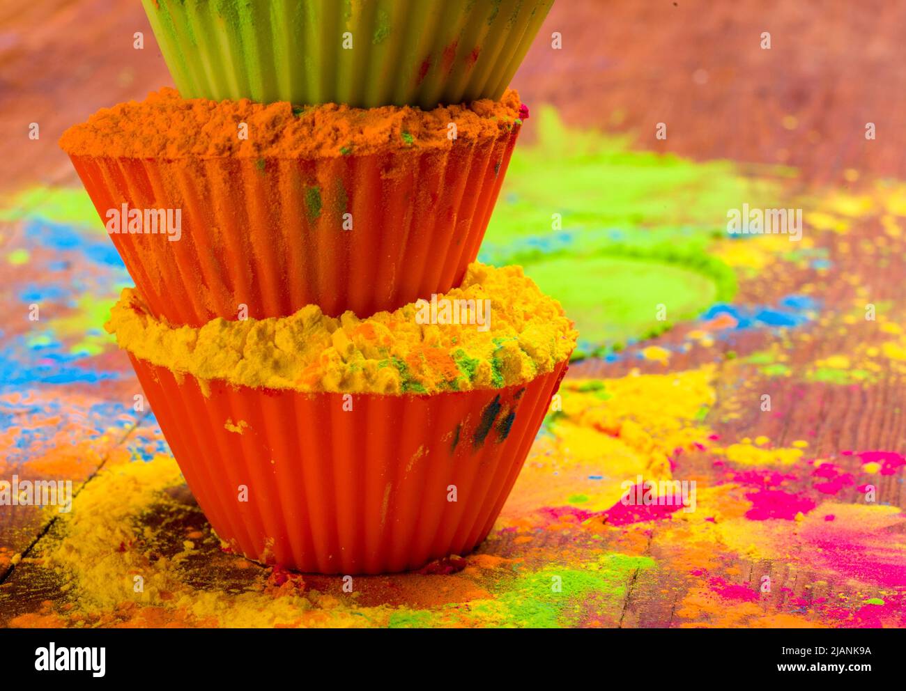 Holi color powder. Organic Gulal colours in bowl for Holi festival, Hindu tradition festive 