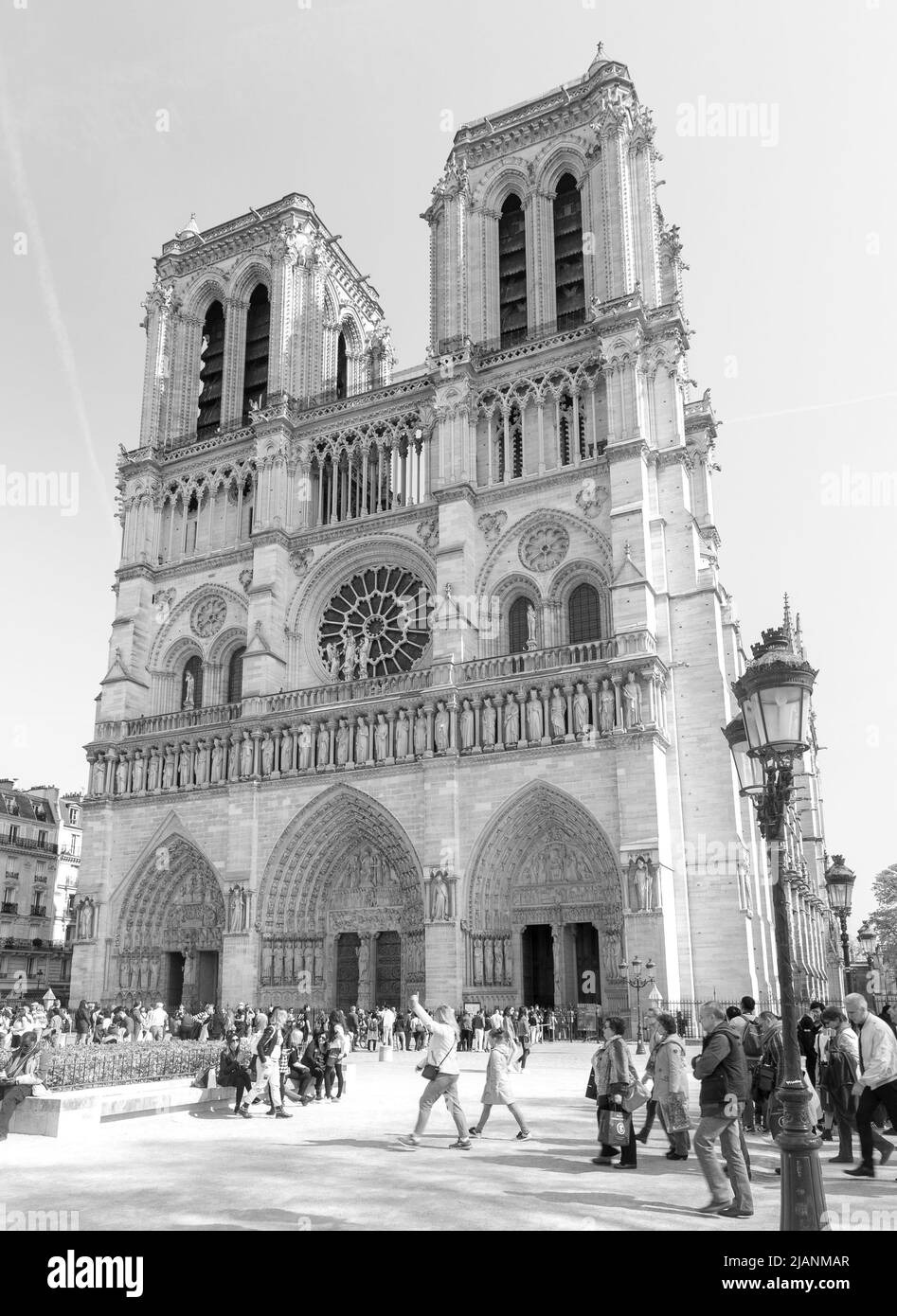 Paris, France, March 27, 2017: The facade of catholic cathedral Notre-Dame de Paris. Built in French Gothic architecture, and it is among the largest Stock Photo