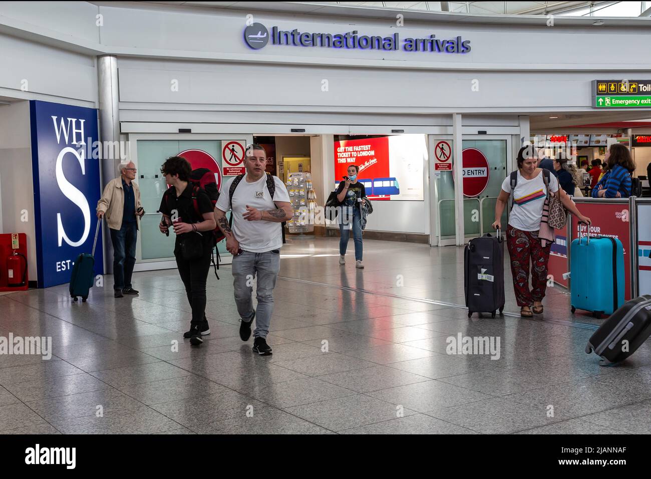 Travelers seen arriving at the Stansted Airport Stock Photo Alamy
