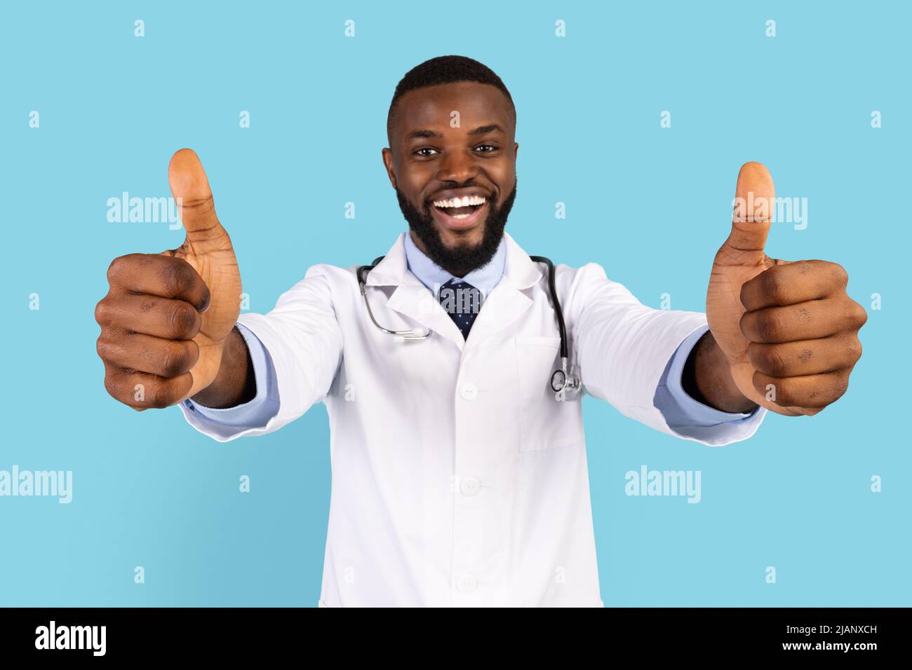 African american doctor thumbs up hi-res stock photography and images ...