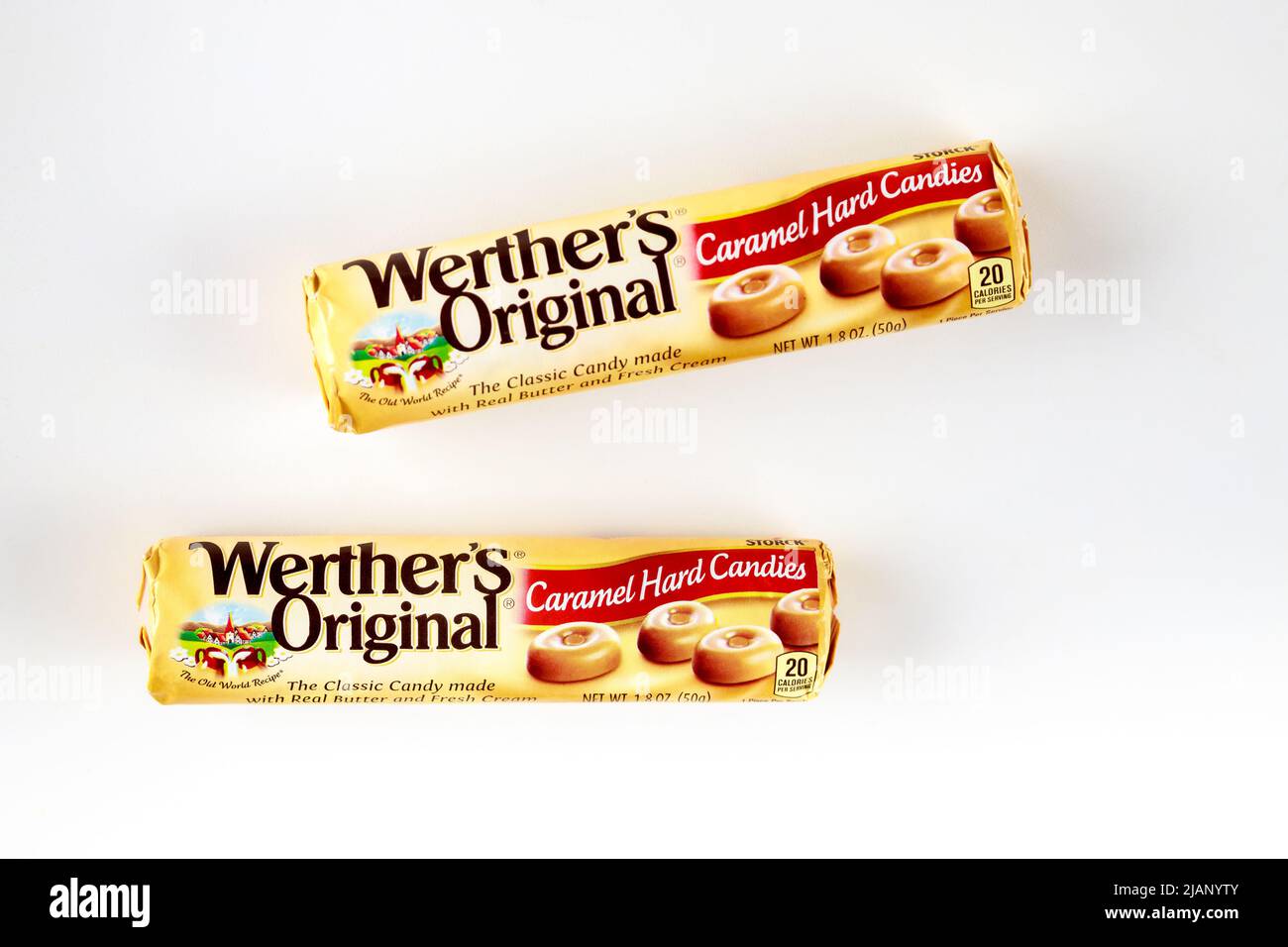 Two Werthers Original classic caramel hard candy on white isolated background. Stock Photo