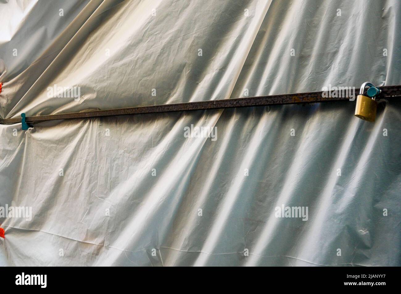 A plastic tarpaulin protects an under renovation shop, Croix-Rousse district, Lyon, Auvergne Rhone-Alps region, Central-Eastern France Stock Photo