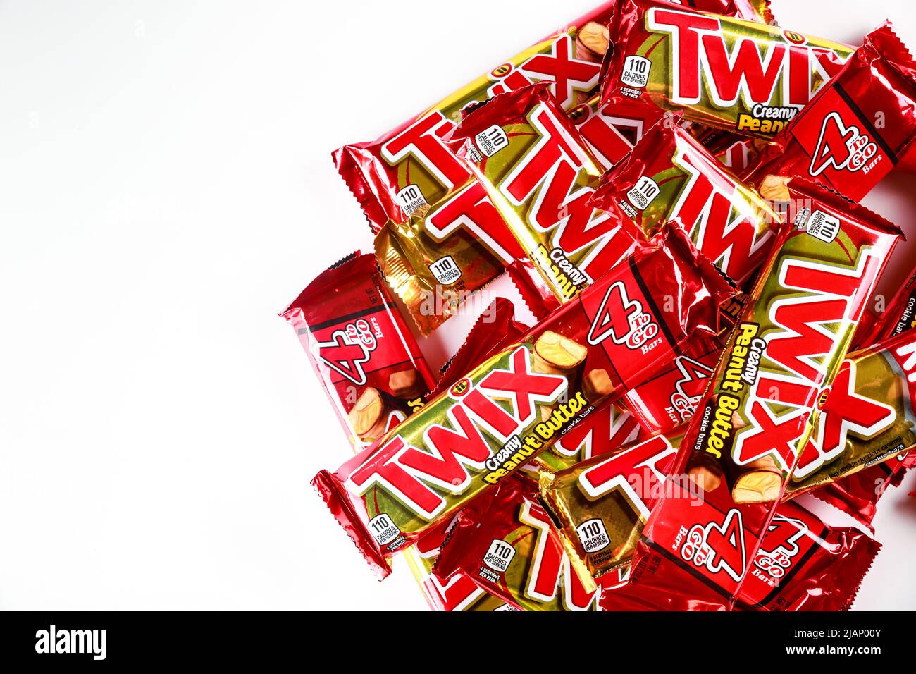 Twix cookies coated with milk chocolate isolated on a white background. Stock Photo