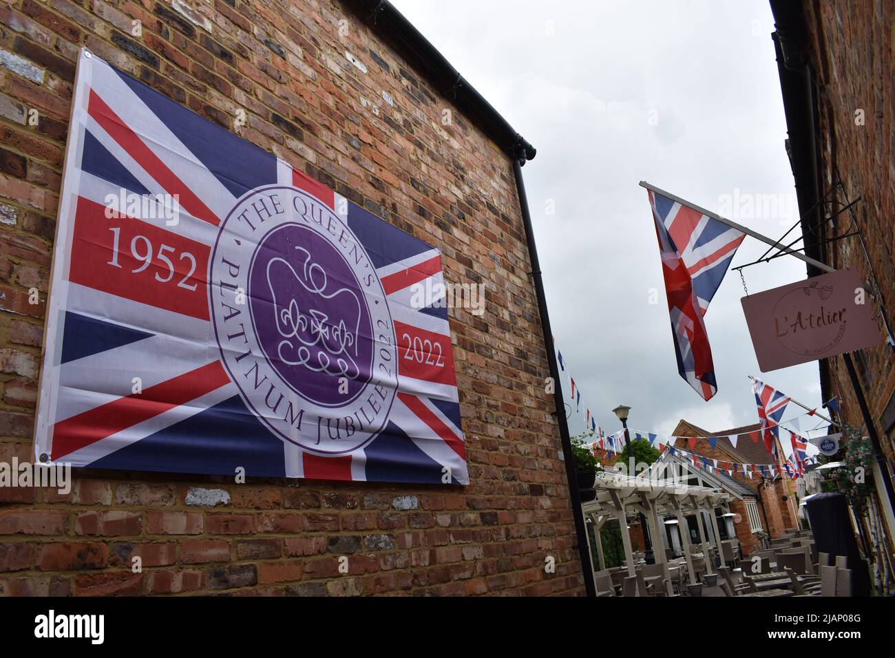 Flags and bunting for the Queen's Platinum Jubilee 2022 in Stony Stratford, Milton Keynes. Stock Photo