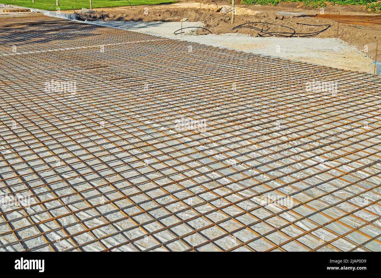 Mesh made of metal reinforcement prepared for concrete pavement road