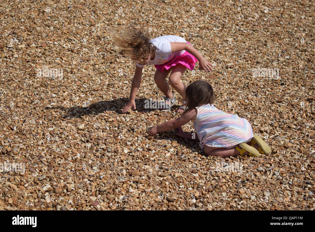 Children playing, hugging, sisters, love, best friends, family, outdoors Stock Photo Alamy