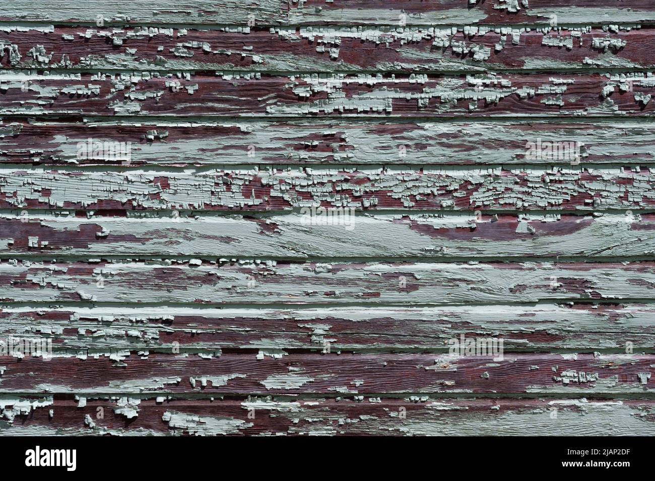 Look at the green paint peeling off the wood side paneling. This is a