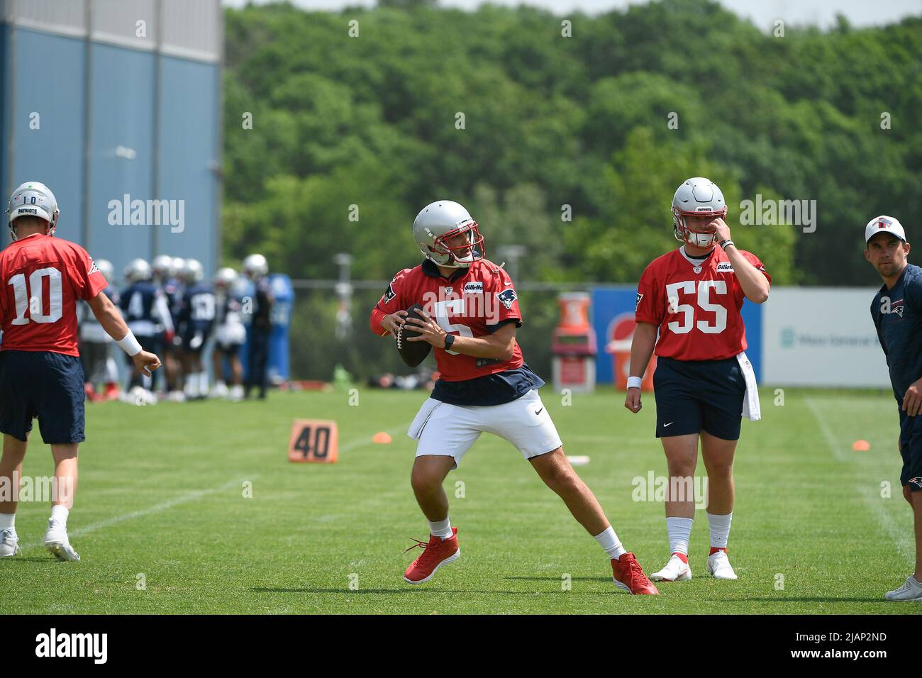 Foxborough, Massachusetts, USA. 31st May, 2022. MA, USA; New England Patriots quarterback Brian Hoyer (5) throws a pass at the team's OTA at Gillette Stadium, in Foxborough, Massachusetts. Eric Canha/CSM/Alamy Live News Stock Photo