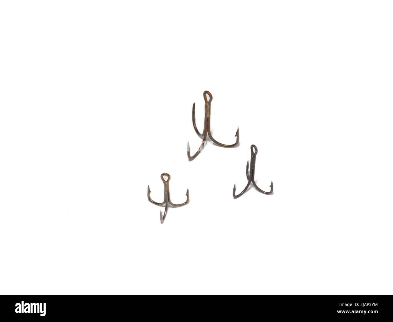 Triple hooks on a white background. Fishing. Tackle. Fishing