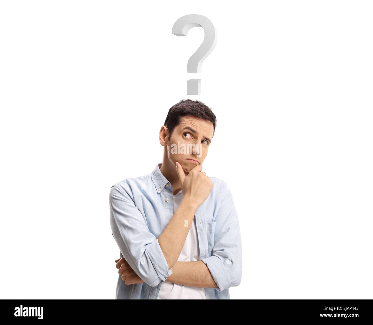 Casual young man thinking with a question mark above his head isolated on blue background Stock Photo