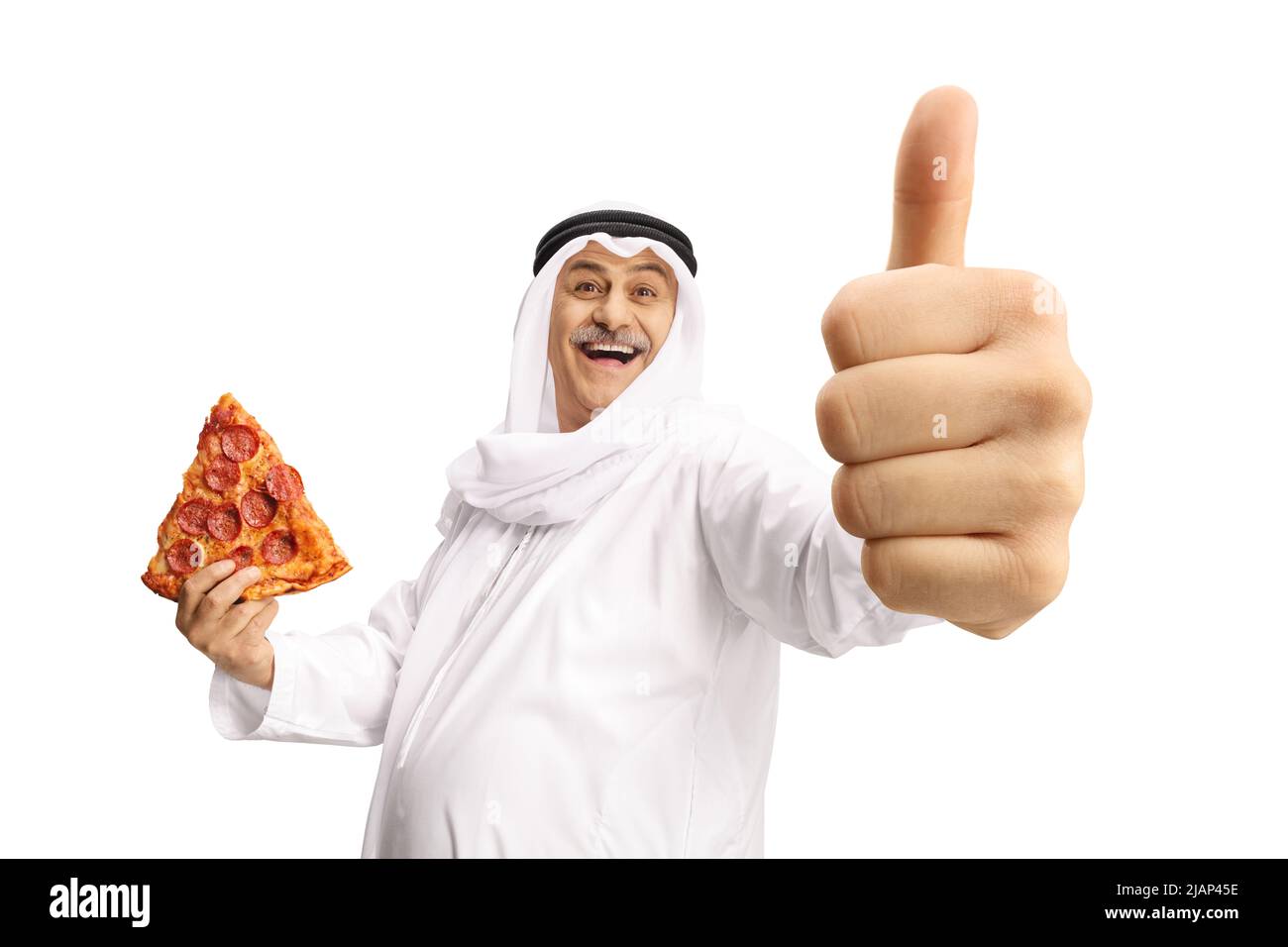 Mature arab man holding pepperoni pizza slice and showing thumbs up isolated on white background Stock Photo