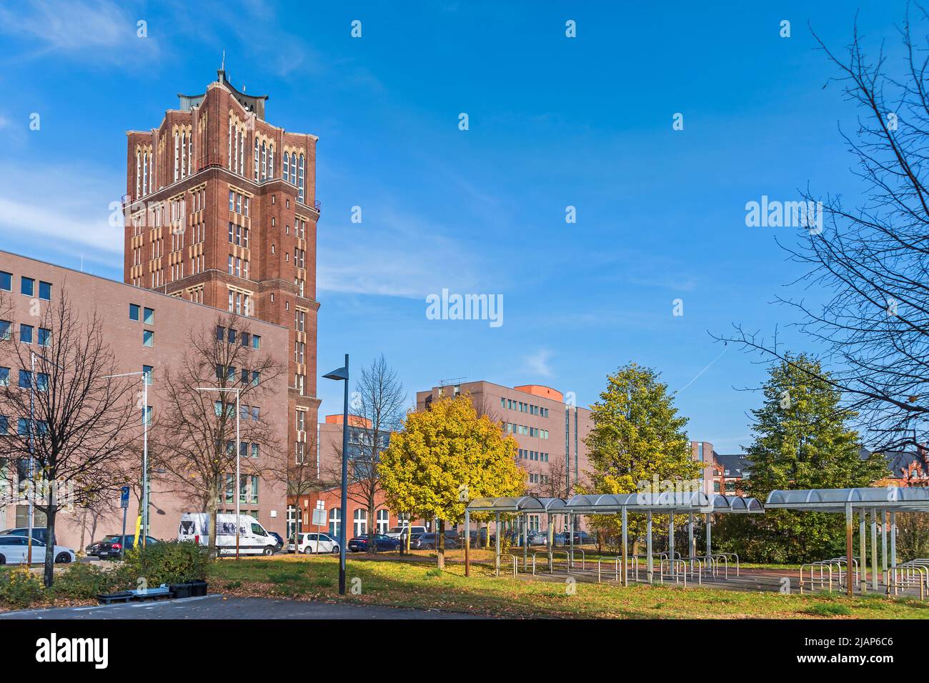 Berlin, Germany - October 30, 2021: Company grounds of the Borsigwerke in Berlin-Tegel with the Streetl Am Borsigturm and a high-rise steel frame Bric Stock Photo