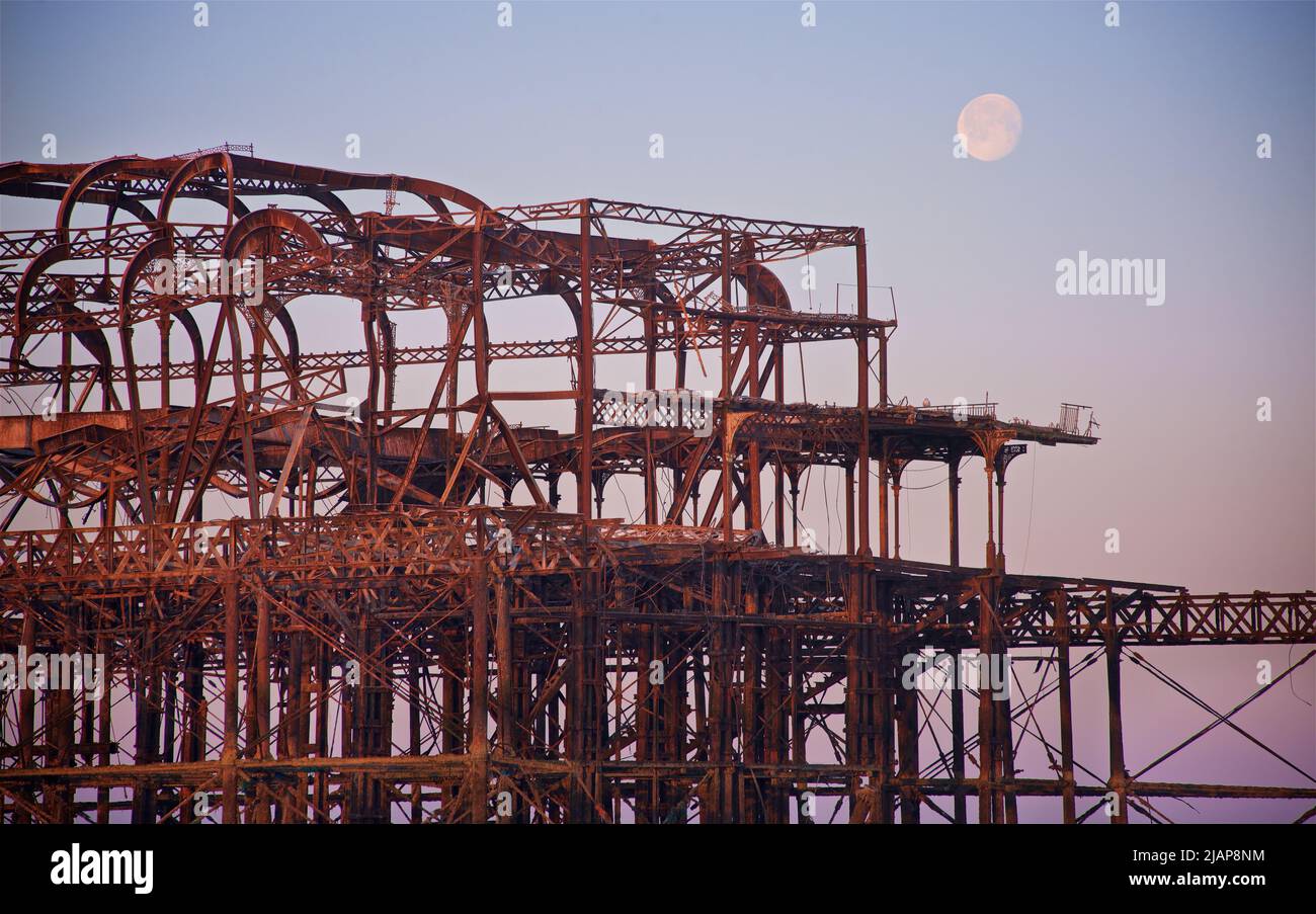 Detail of the rusting remains of the dilapidated West Pier at dawn low tide. Brighton & Hove